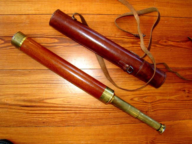 A fine antique English two-draw telescope circa 1865-1870 with its' original leather carrying case